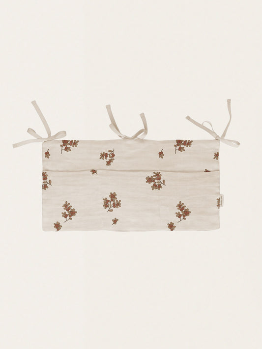 Muślinowy organizer na łóżeczko