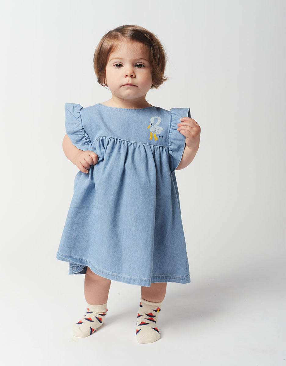 Zwiewna sukienka Baby Pelicane