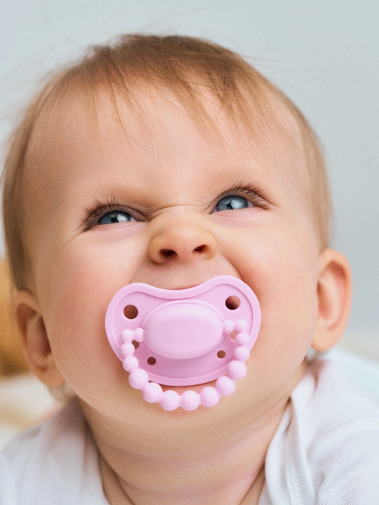 Smoczek pozycjonujący Luu Kids