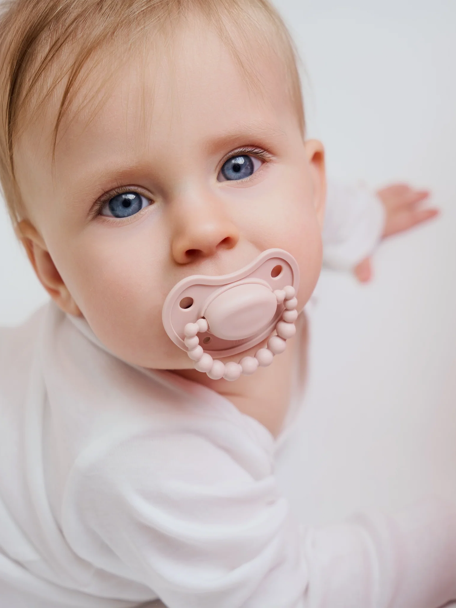 Smoczek pozycjonujący Luu Kids