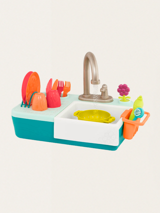 Zlew z działającym kranem i akcesoriami