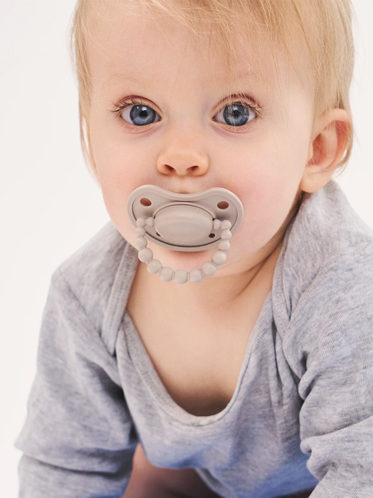 Smoczek pozycjonujący Luu Kids