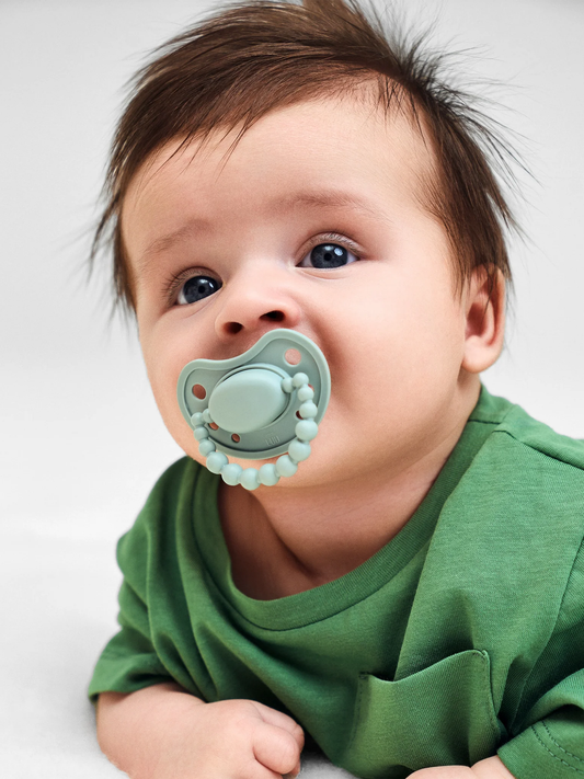 Smoczek pozycjonujący Luu Kids