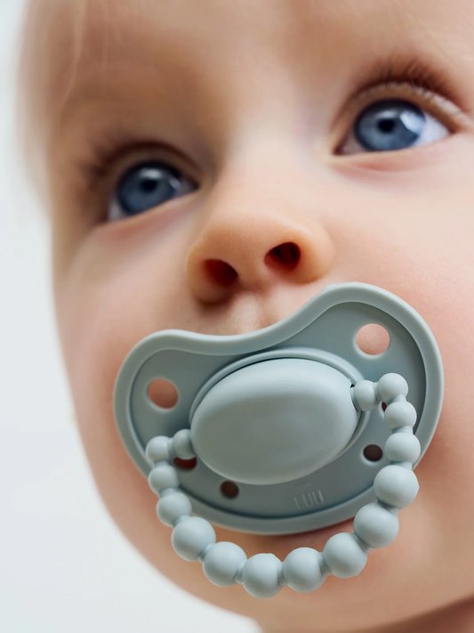 Smoczek pozycjonujący Luu Kids