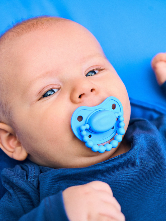 Smoczek pozycjonujący Luu Kids