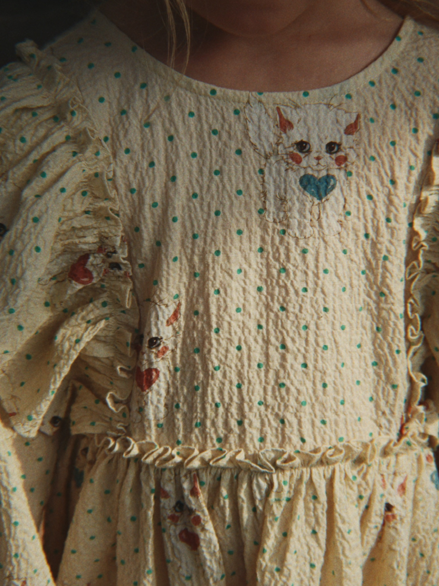 Efektowna bawełniana sukienka z kokardą Elin