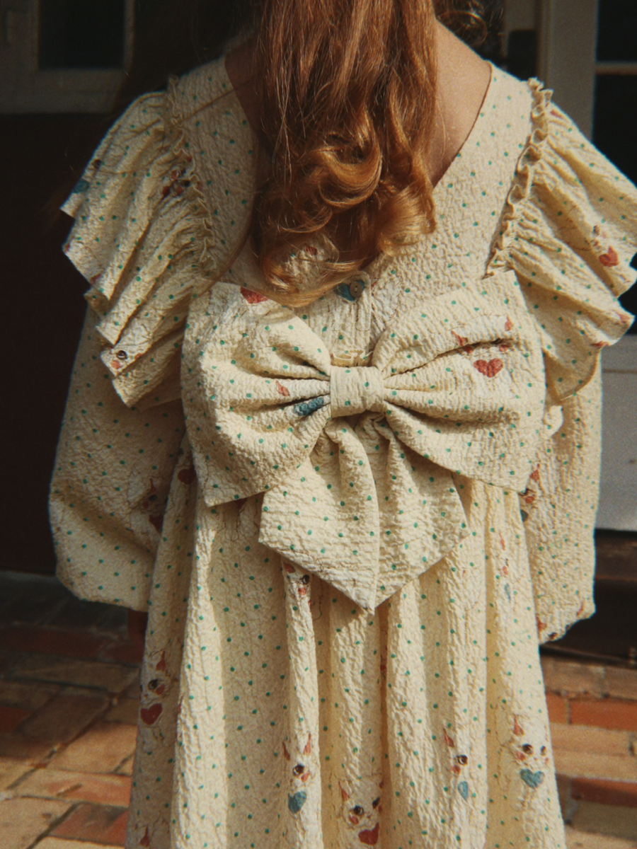 Efektowna bawełniana sukienka z kokardą Elin