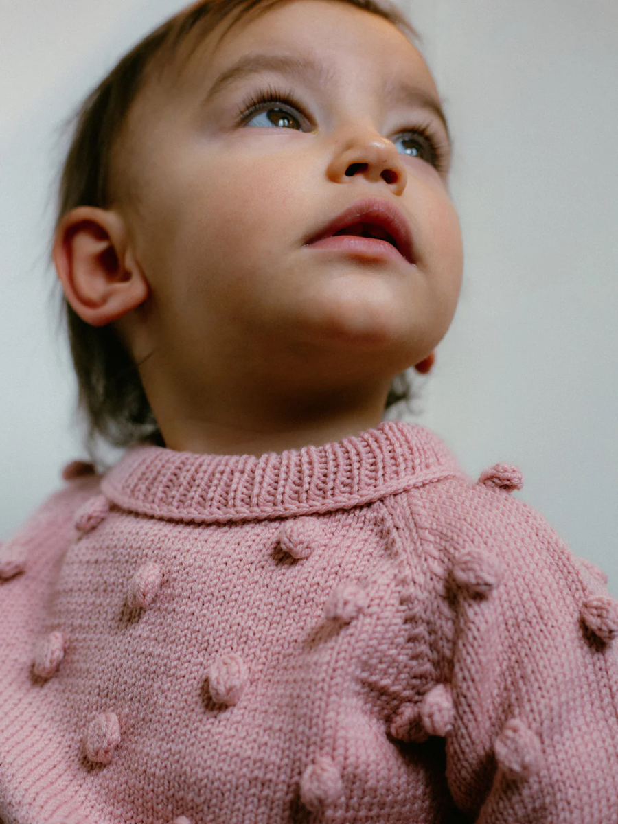 Popcorn-weicher rosa Merinowollpullover