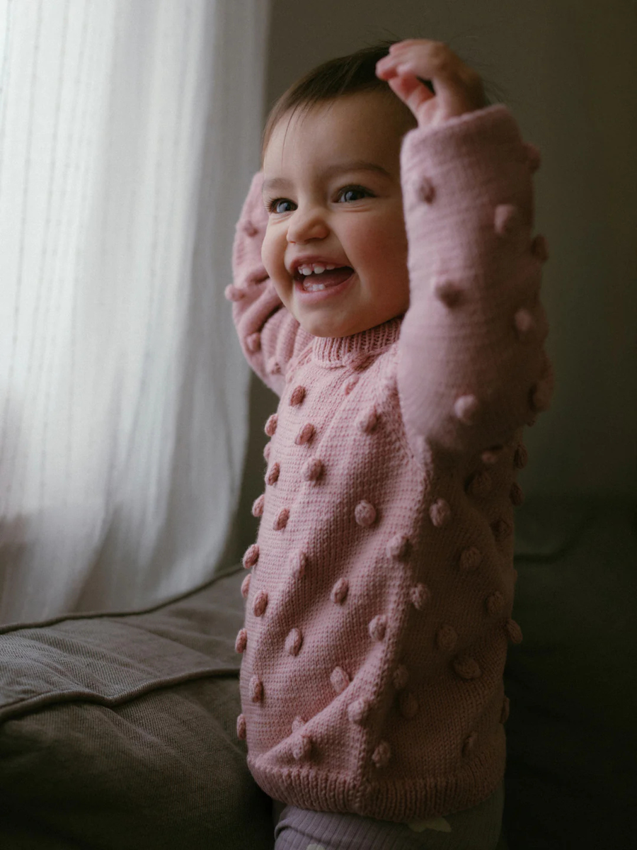 Popcorn-weicher rosa Merinowollpullover