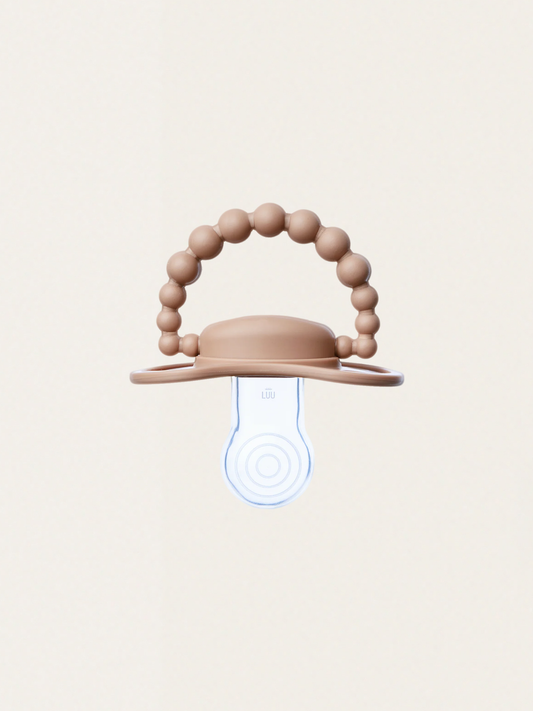 Smoczek pozycjonujący Luu Kids Milk Hazelnut