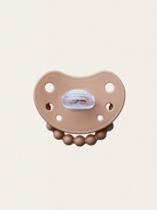 Smoczek pozycjonujący Luu Kids Milk Hazelnut