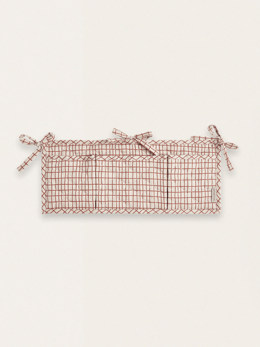 Satynowy organizer do łóżeczka